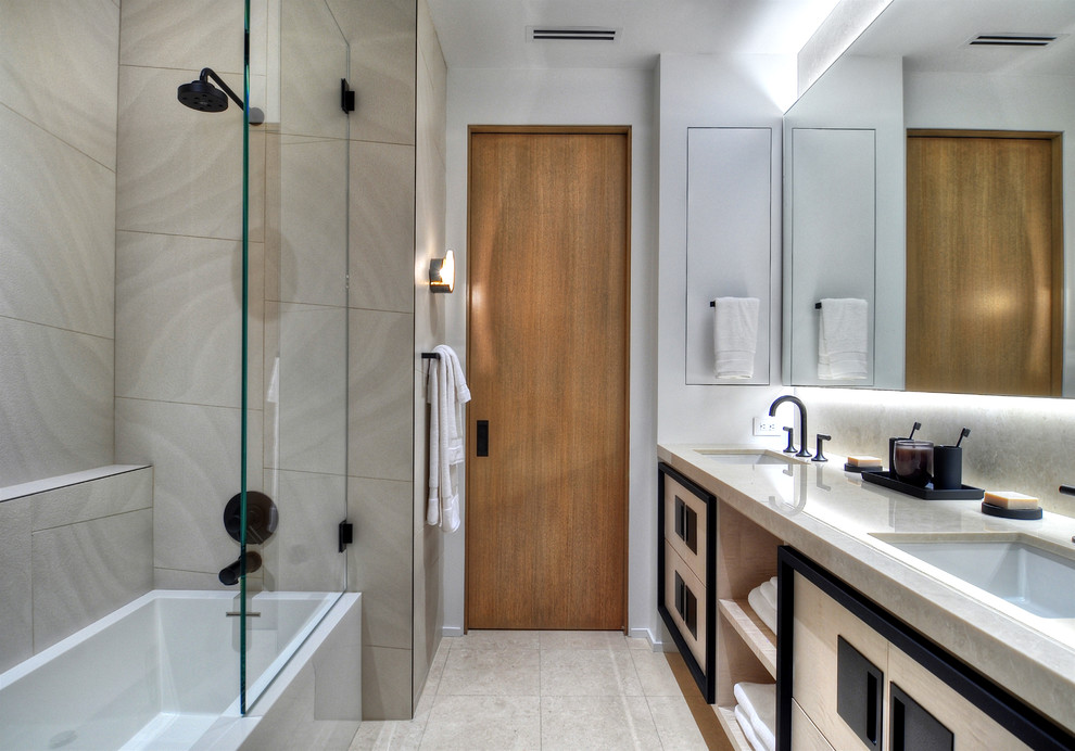 Photo of a contemporary ensuite bathroom in Orange County with a freestanding bath.