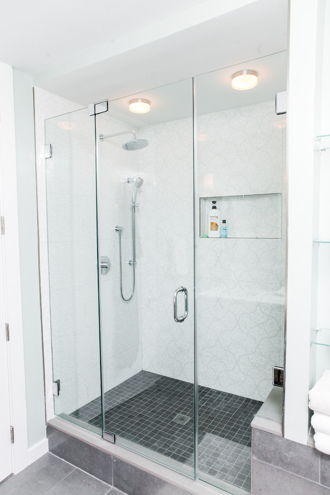 Mid-sized cottage master gray tile, white tile and porcelain tile slate floor alcove shower photo in New York with beaded inset cabinets, blue cabinets, a one-piece toilet, blue walls, an undermount sink and quartz countertops