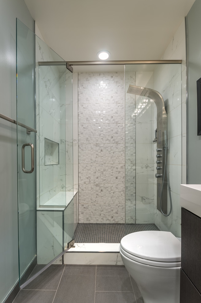 Inspiration for a small transitional kids' brown tile and glass sheet porcelain tile alcove shower remodel in San Francisco with flat-panel cabinets, dark wood cabinets, a one-piece toilet, green walls, an integrated sink and solid surface countertops
