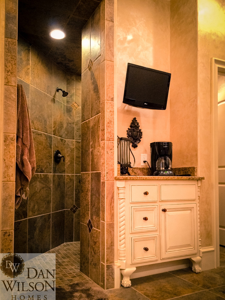 Bathroom - large traditional master green tile and ceramic tile ceramic tile bathroom idea in Austin with an undermount sink, furniture-like cabinets, beige cabinets, granite countertops, a two-piece toilet and beige walls
