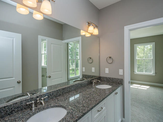 Design ideas for a large classic family bathroom in Atlanta with a submerged sink, recessed-panel cabinets, light wood cabinets, granite worktops, a submerged bath, a corner shower and beige walls.