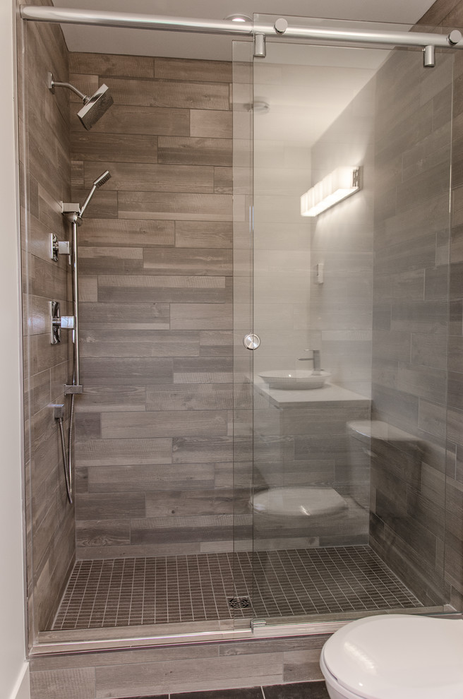 Example of a small minimalist master brown tile and ceramic tile ceramic tile alcove shower design in Other with flat-panel cabinets, white cabinets, a one-piece toilet, white walls and an integrated sink