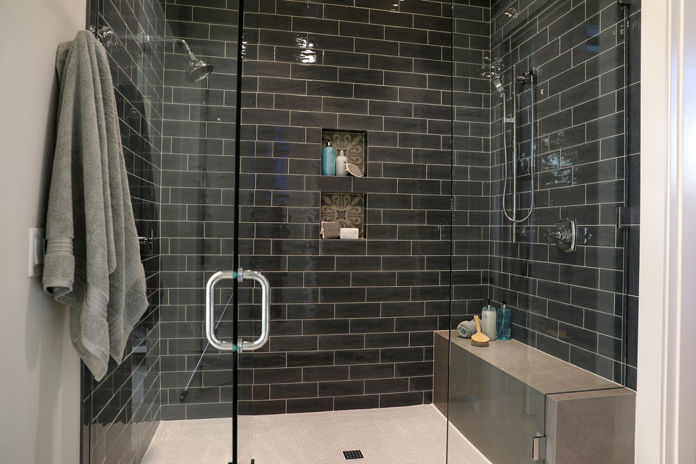 This is an example of a large rural ensuite bathroom in Portland with shaker cabinets, white cabinets, a freestanding bath, a walk-in shower, a two-piece toilet, blue tiles, ceramic tiles, grey walls, ceramic flooring, a submerged sink, engineered stone worktops, multi-coloured floors, a hinged door and white worktops.