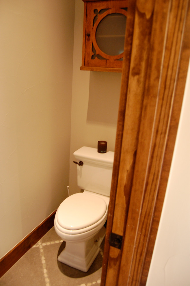 Example of a mountain style powder room design in Dallas