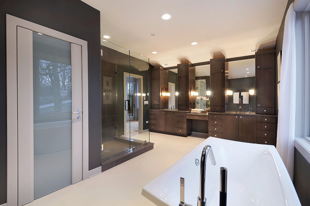Bathroom - large contemporary master multicolored tile and mosaic tile travertine floor and beige floor bathroom idea in Chicago with flat-panel cabinets, dark wood cabinets, brown walls, an undermount sink, granite countertops and a hinged shower door