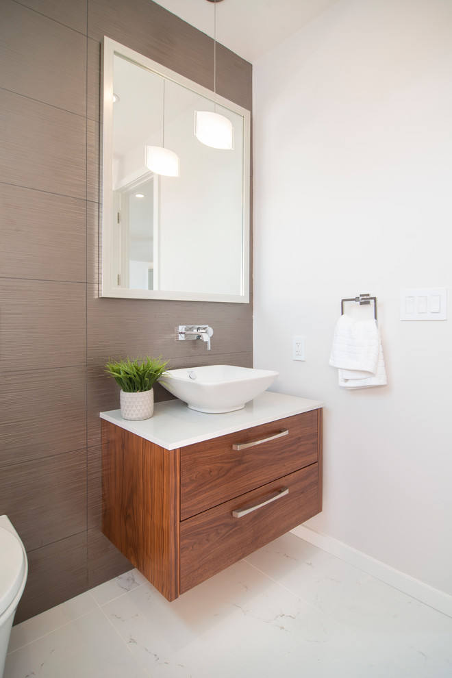 This is an example of a contemporary bathroom in San Francisco with flat-panel cabinets and medium wood cabinets.