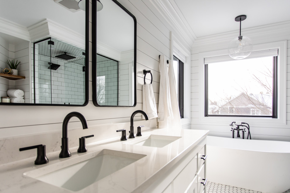 Example of a large farmhouse master white tile and subway tile ceramic tile, white floor, double-sink and shiplap wall bathroom design in Minneapolis with shaker cabinets, white cabinets, a two-piece toilet, white walls, an undermount sink, quartz countertops, a hinged shower door, white countertops and a built-in vanity