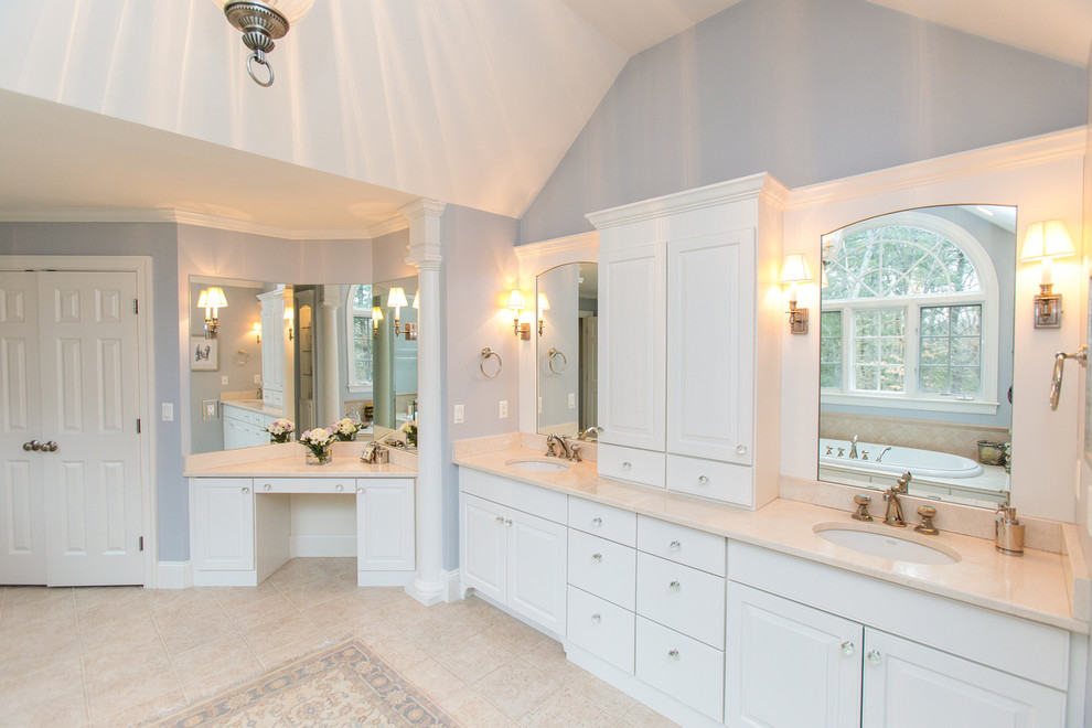 Inspiration for a huge timeless master blue tile and ceramic tile ceramic tile and beige floor bathroom remodel in Boston with raised-panel cabinets, white cabinets, a two-piece toilet, gray walls, an integrated sink and marble countertops