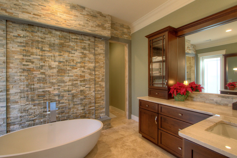 Example of an arts and crafts master stone tile travertine floor bathroom design in Atlanta with shaker cabinets, dark wood cabinets, an undermount sink and granite countertops