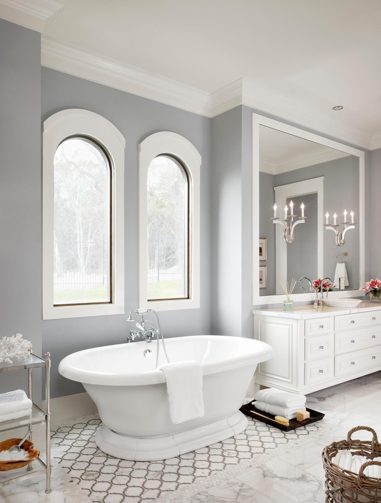 Inspiration for a contemporary freestanding bathtub remodel in Austin with a vessel sink