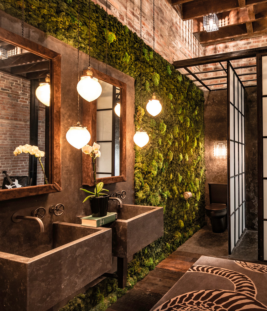 Bathroom - industrial dark wood floor bathroom idea in Denver with a two-piece toilet and a wall-mount sink