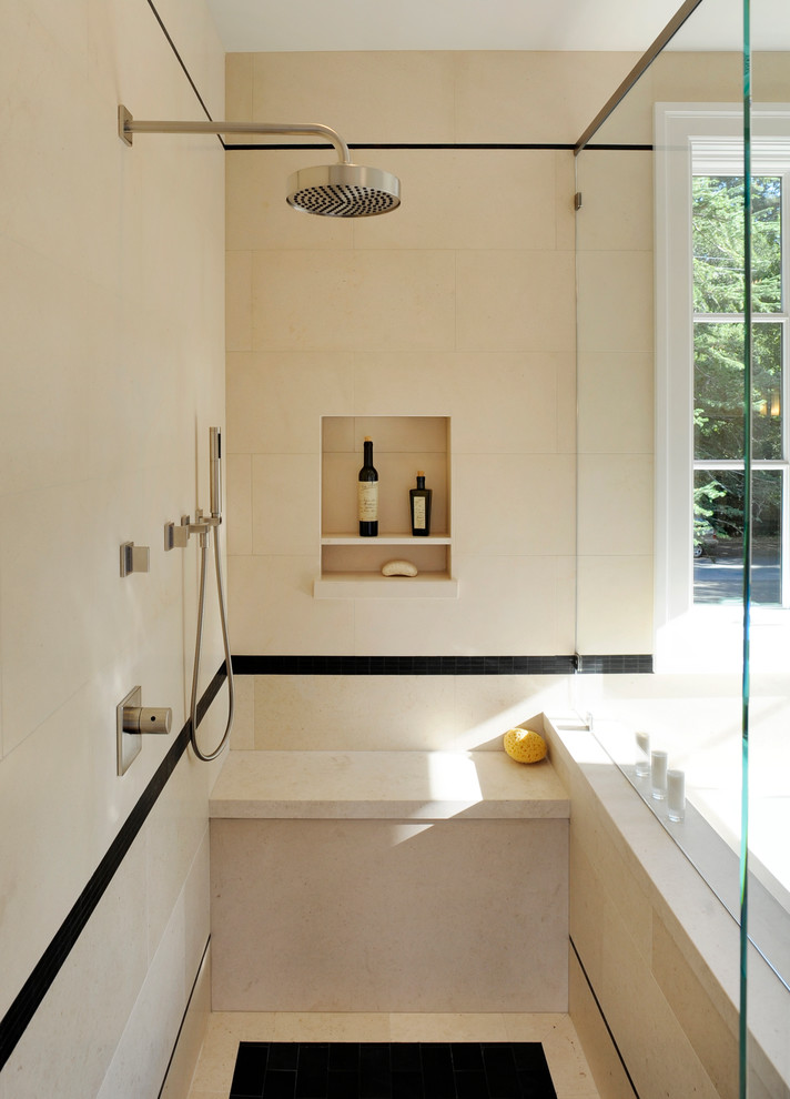 Large traditional ensuite bathroom in San Francisco with dark wood cabinets, a two-piece toilet, beige tiles, black tiles, stone tiles, a submerged sink and a corner shower.