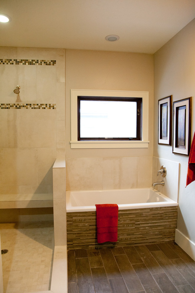 Classic bathroom in Boise with a shower/bath combination, beige tiles, porcelain tiles and porcelain flooring.