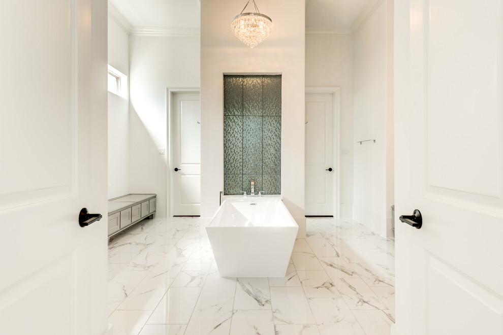 Photo of a classic ensuite bathroom in Dallas with recessed-panel cabinets, white cabinets, a freestanding bath, a built-in shower, a two-piece toilet, white walls, marble flooring, a vessel sink, engineered stone worktops, white floors and a hinged door.