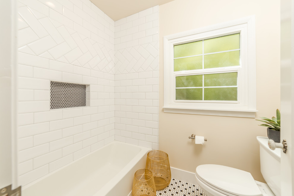 Mid-sized elegant master white tile and subway tile mosaic tile floor, multicolored floor and single-sink bathroom photo in Sacramento with shaker cabinets, white cabinets, a one-piece toilet, beige walls, a drop-in sink, quartzite countertops, white countertops and a built-in vanity