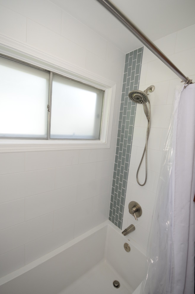 Alcove bathtub - small modern white tile and ceramic tile alcove bathtub idea in DC Metro