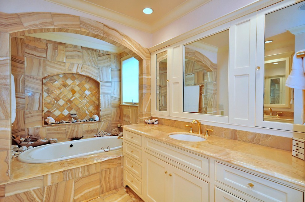 This is an example of a traditional bathroom in Charlotte with a wall niche.