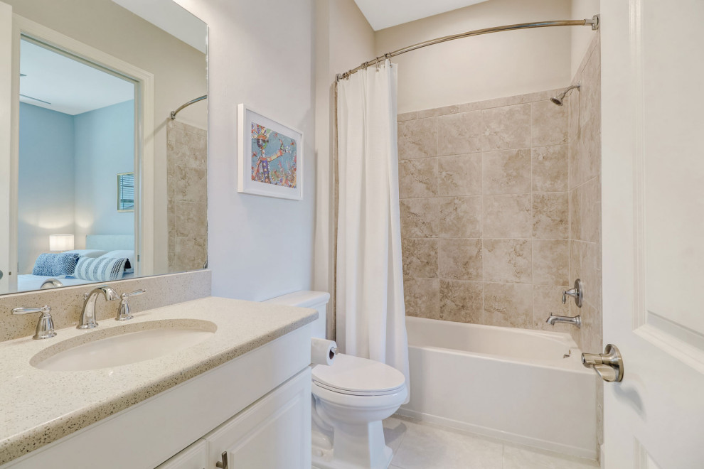 Inspiration for a small 1950s 3/4 beige tile and ceramic tile ceramic tile, white floor and double-sink bathroom remodel in Other with open cabinets, white cabinets, a one-piece toilet, gray walls, a drop-in sink, granite countertops, beige countertops and a built-in vanity