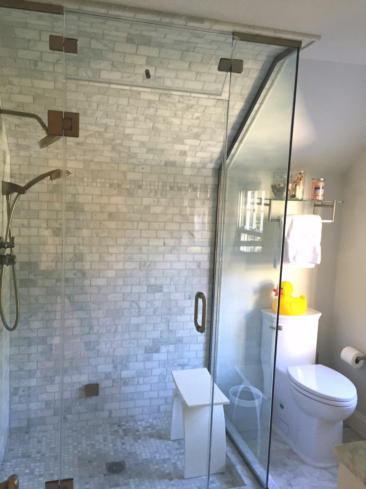 Medium sized contemporary sauna bathroom in New York with a submerged sink, flat-panel cabinets, white cabinets, a two-piece toilet, white walls, multi-coloured tiles and metro tiles.