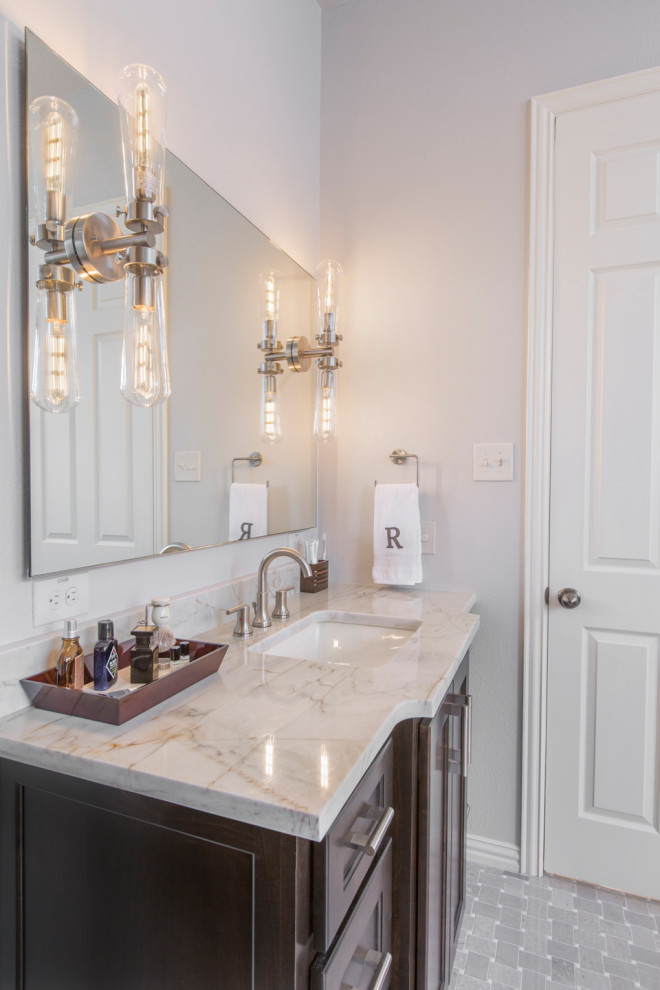 Inspiration for a mid-sized modern master gray tile and ceramic tile mosaic tile floor and gray floor bathroom remodel in Other with shaker cabinets, brown cabinets, a two-piece toilet, gray walls, an undermount sink, quartzite countertops, a hinged shower door and beige countertops