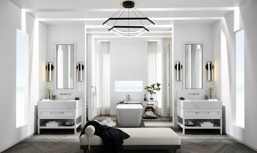 Inspiration för stora moderna vitt en-suite badrum, med skåp i shakerstil, vita skåp, ett fristående badkar, en öppen dusch, en vägghängd toalettstol, vit kakel, porslinskakel, vita väggar, mellanmörkt trägolv, ett undermonterad handfat, bänkskiva i akrylsten, grått golv och med dusch som är öppen