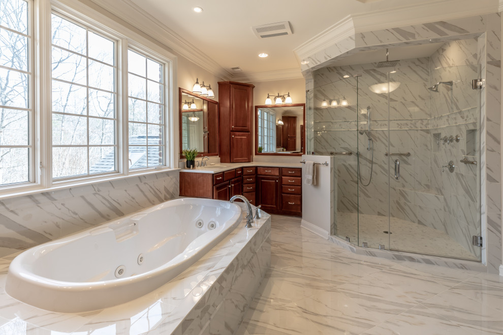 Design ideas for a large contemporary ensuite bathroom in DC Metro with medium wood cabinets, beige tiles, granite worktops and beige worktops.