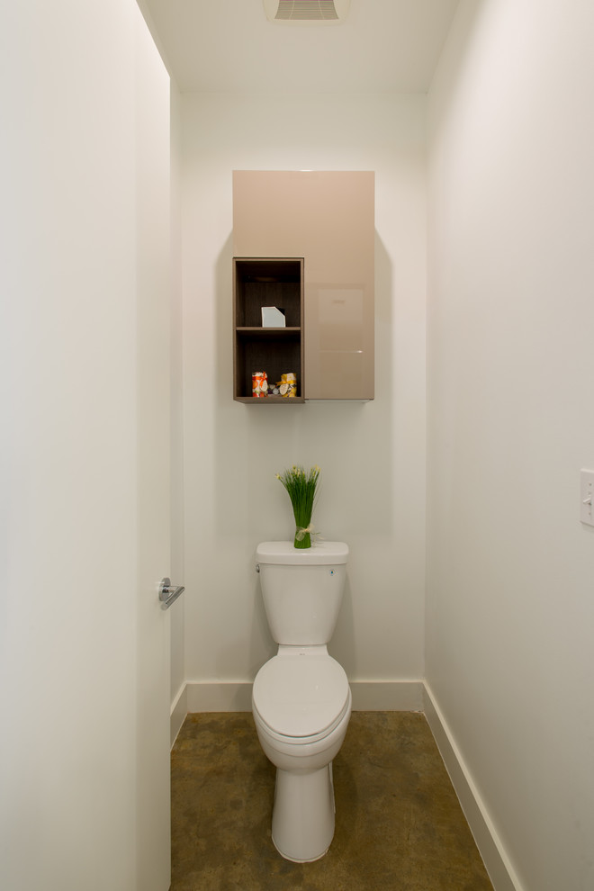 Example of a trendy powder room design in Houston