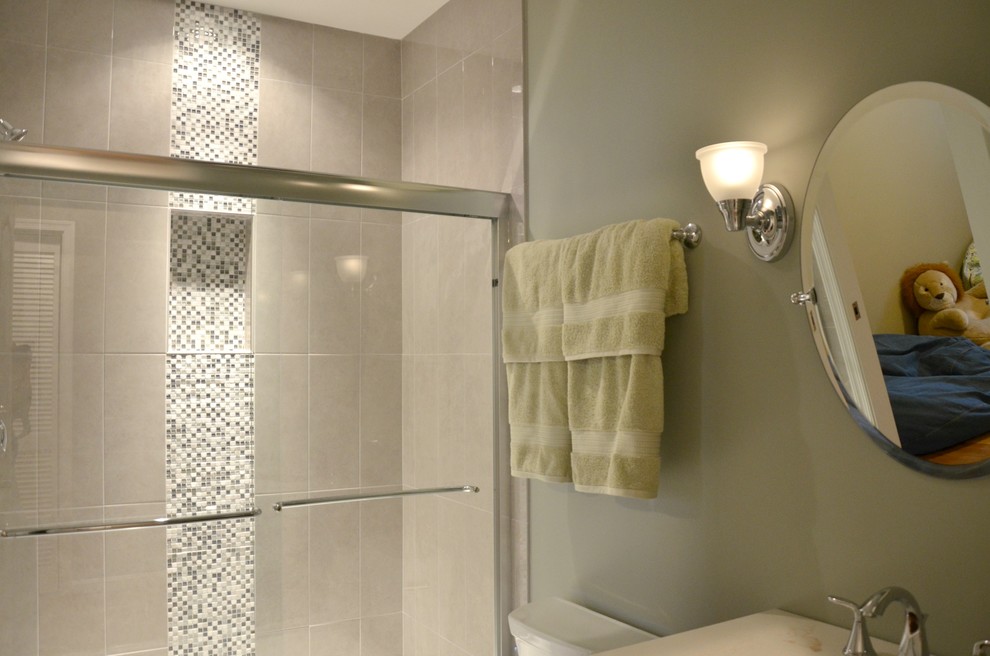 Photo of a medium sized classic shower room bathroom in DC Metro with a submerged sink, freestanding cabinets, dark wood cabinets, an alcove shower, a one-piece toilet, multi-coloured tiles, mosaic tiles, green walls and porcelain flooring.