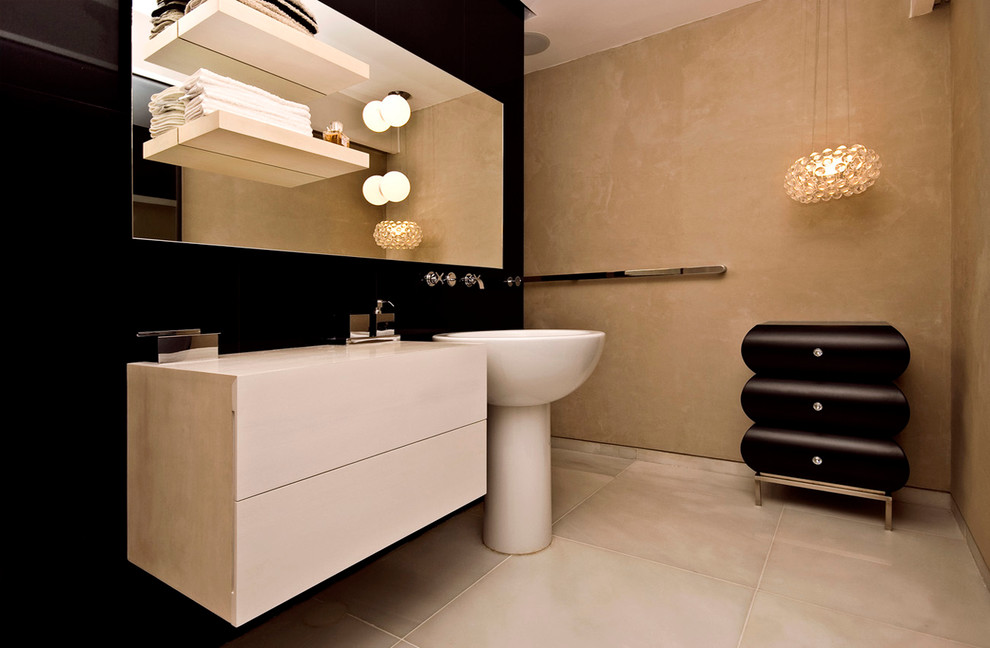 Idee per una stanza da bagno minimalista con lavabo a colonna