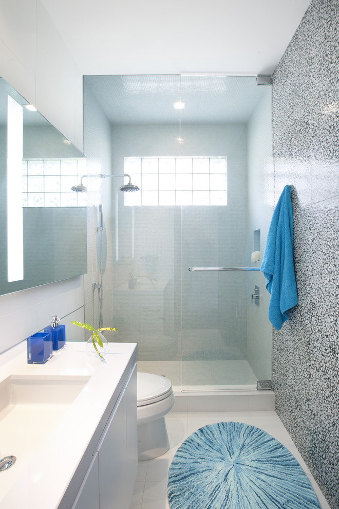 Example of a trendy multicolored tile alcove shower design in Miami with an undermount sink, flat-panel cabinets and white cabinets