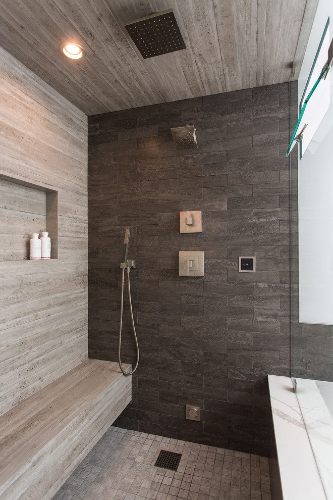 Design ideas for a large scandinavian ensuite bathroom in Los Angeles with raised-panel cabinets, dark wood cabinets, a corner bath, an alcove shower, brown tiles, ceramic tiles, white walls, light hardwood flooring, a submerged sink, quartz worktops, brown floors, a hinged door, white worktops and feature lighting.