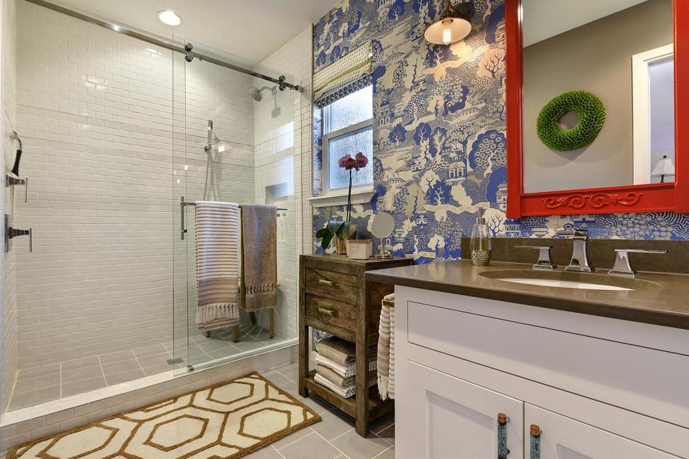 Inspiration for a large eclectic gray floor bathroom remodel in Austin with white cabinets, a two-piece toilet, multicolored walls and an undermount sink