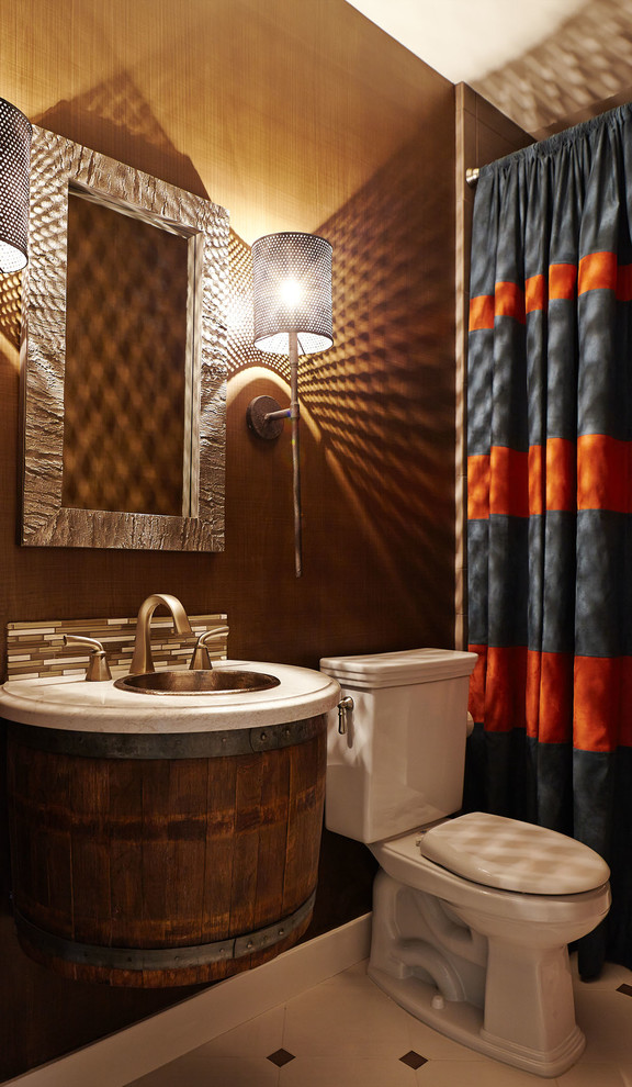 Inspiration for a small transitional 3/4 brown tile and ceramic tile porcelain tile bathroom remodel in San Francisco with a drop-in sink, medium tone wood cabinets, solid surface countertops, a two-piece toilet and brown walls