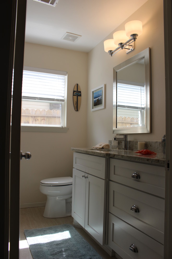 Inspiration for a medium sized classic family bathroom in Houston with shaker cabinets and white cabinets.