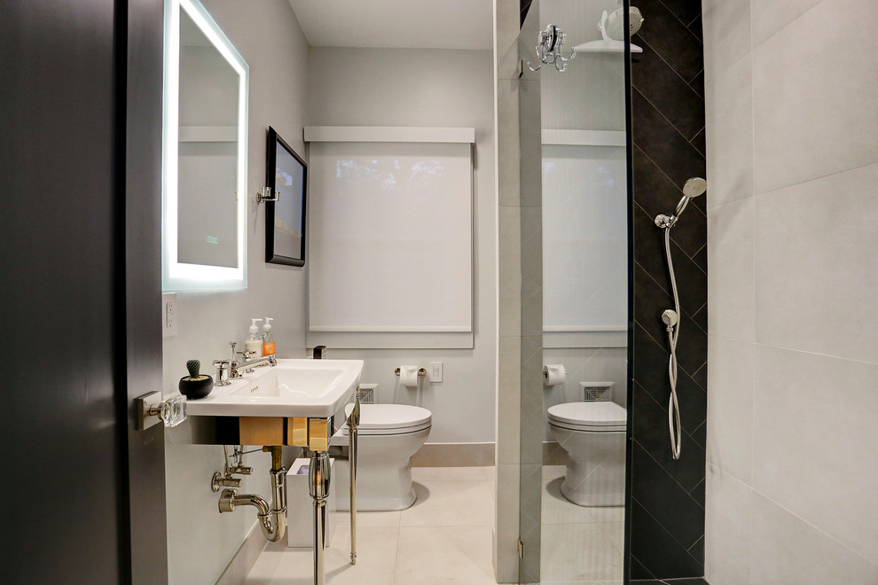 Corner shower - small contemporary 3/4 white tile and porcelain tile porcelain tile corner shower idea in Houston with brown cabinets, a one-piece toilet, black walls and a pedestal sink
