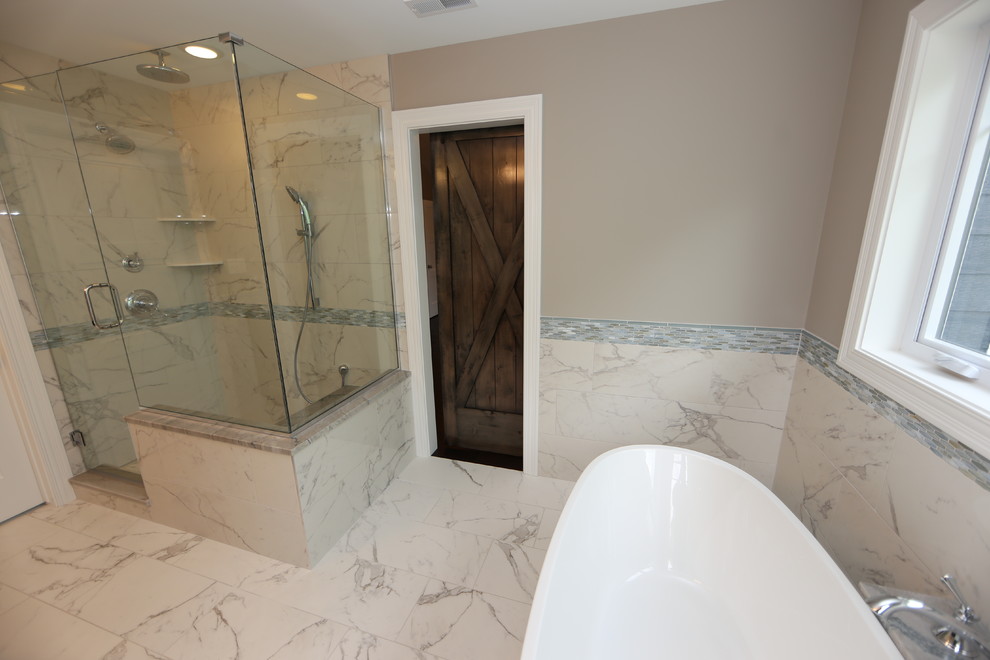 Example of a large arts and crafts master gray tile and porcelain tile porcelain tile and multicolored floor bathroom design in Chicago with flat-panel cabinets, dark wood cabinets, a two-piece toilet, brown walls, an undermount sink, quartzite countertops and a hinged shower door