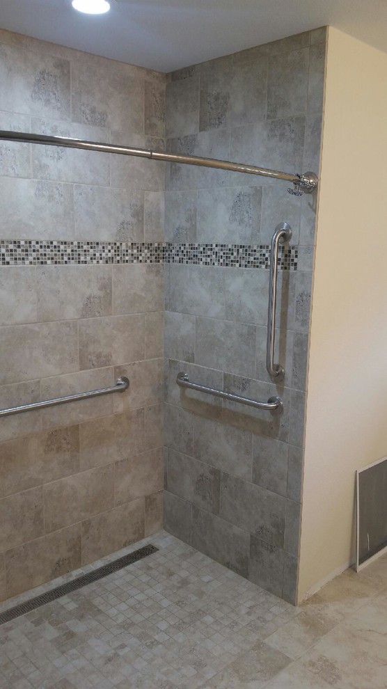 Inspiration for a large classic shower room bathroom in Other with flat-panel cabinets, medium wood cabinets, a walk-in shower, a two-piece toilet, beige tiles, ceramic tiles, yellow walls, ceramic flooring, an integrated sink and solid surface worktops.