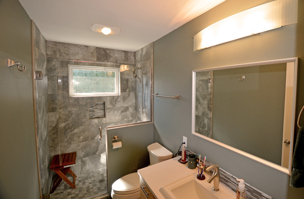 Example of a trendy gray tile walk-in shower design in Portland