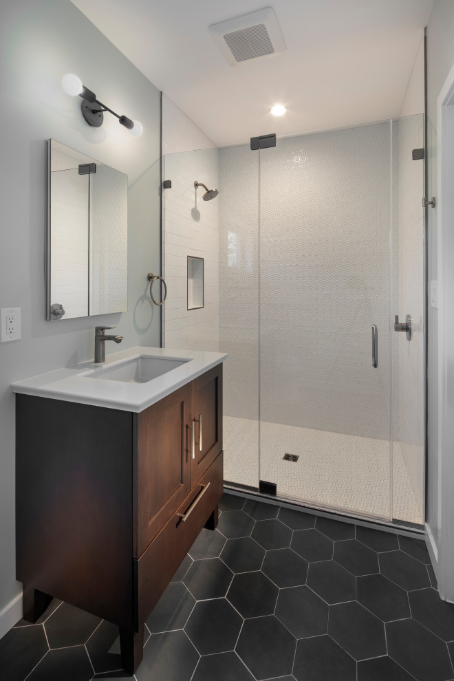 Bathroom - modern master white tile and ceramic tile ceramic tile and black floor bathroom idea in DC Metro with recessed-panel cabinets, brown cabinets and a console sink