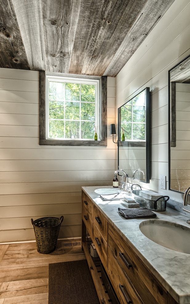 This is an example of an expansive rustic bathroom in New York.