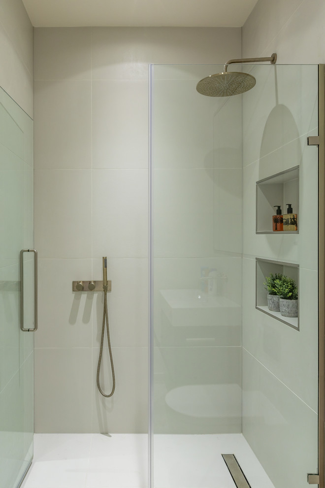 This is an example of a contemporary bathroom in London with a walk-in shower.