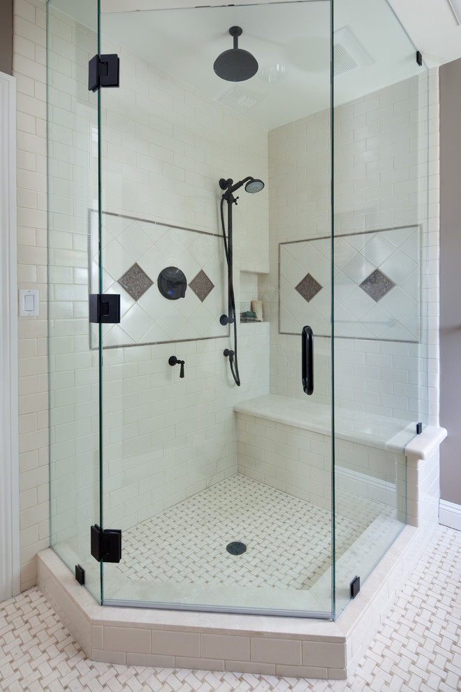 Mid-sized elegant master porcelain tile corner shower photo in Los Angeles with raised-panel cabinets, dark wood cabinets, a two-piece toilet, gray walls and an undermount sink