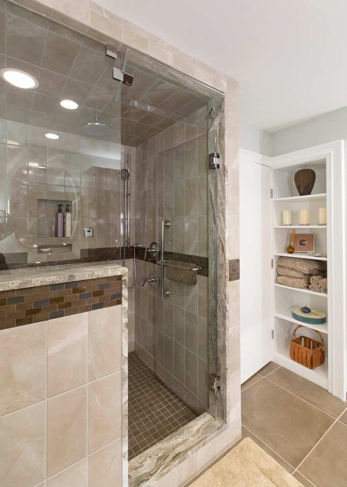 This is an example of a classic ensuite bathroom in Cleveland with shaker cabinets, dark wood cabinets, an alcove shower, beige tiles, porcelain tiles, blue walls, porcelain flooring, a submerged sink, granite worktops and a hinged door.