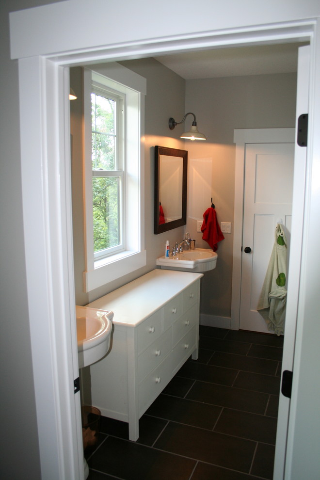 This is an example of a farmhouse bathroom in Other.