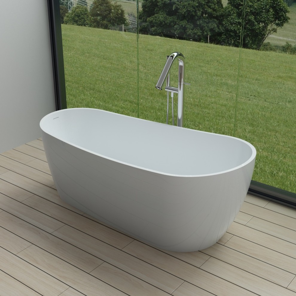 Esempio di una grande stanza da bagno padronale minimalista con vasca freestanding e pavimento beige