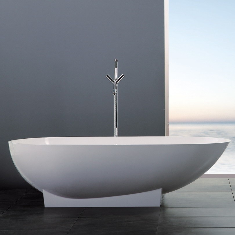 Example of a large minimalist master black floor freestanding bathtub design in Los Angeles with gray walls