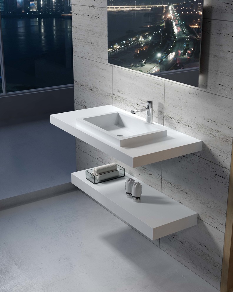 Esempio di una piccola stanza da bagno padronale contemporanea con pareti grigie, lavabo sospeso, top in superficie solida, pavimento grigio e top bianco
