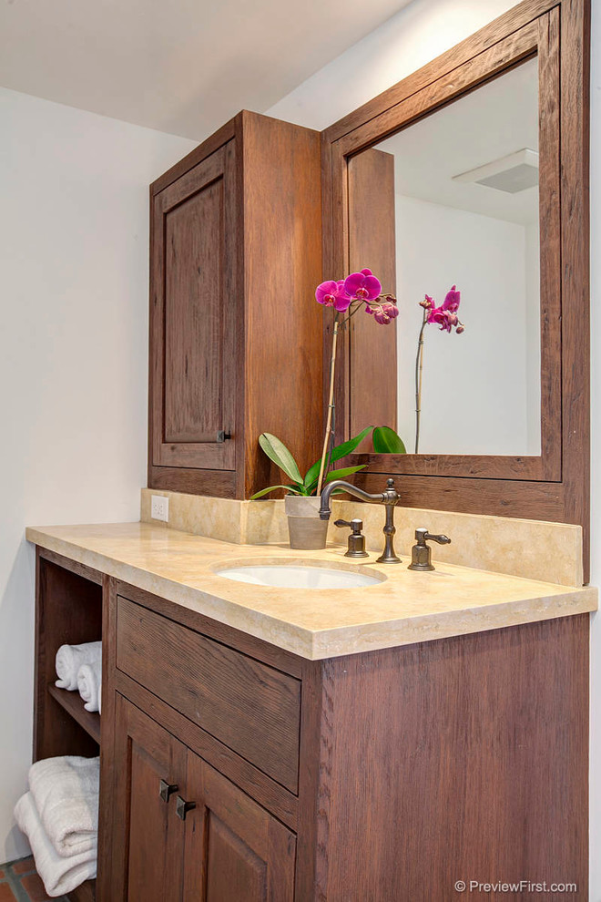 Bathroom - large mediterranean master bathroom idea in San Diego with an undermount sink, recessed-panel cabinets and dark wood cabinets