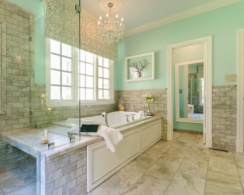 This is an example of a classic bathroom in Richmond with a built-in bath, beige tiles and metro tiles.