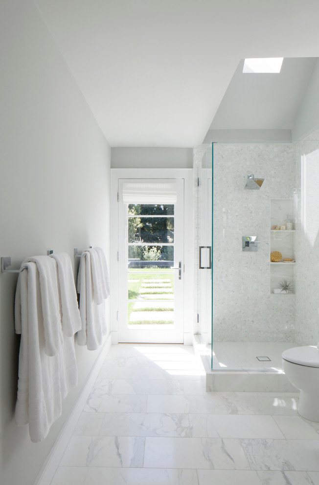 This is an example of a medium sized traditional family bathroom in San Francisco with white cabinets, white tiles, marble flooring, a submerged sink, engineered stone worktops, a corner shower, a one-piece toilet and white walls.